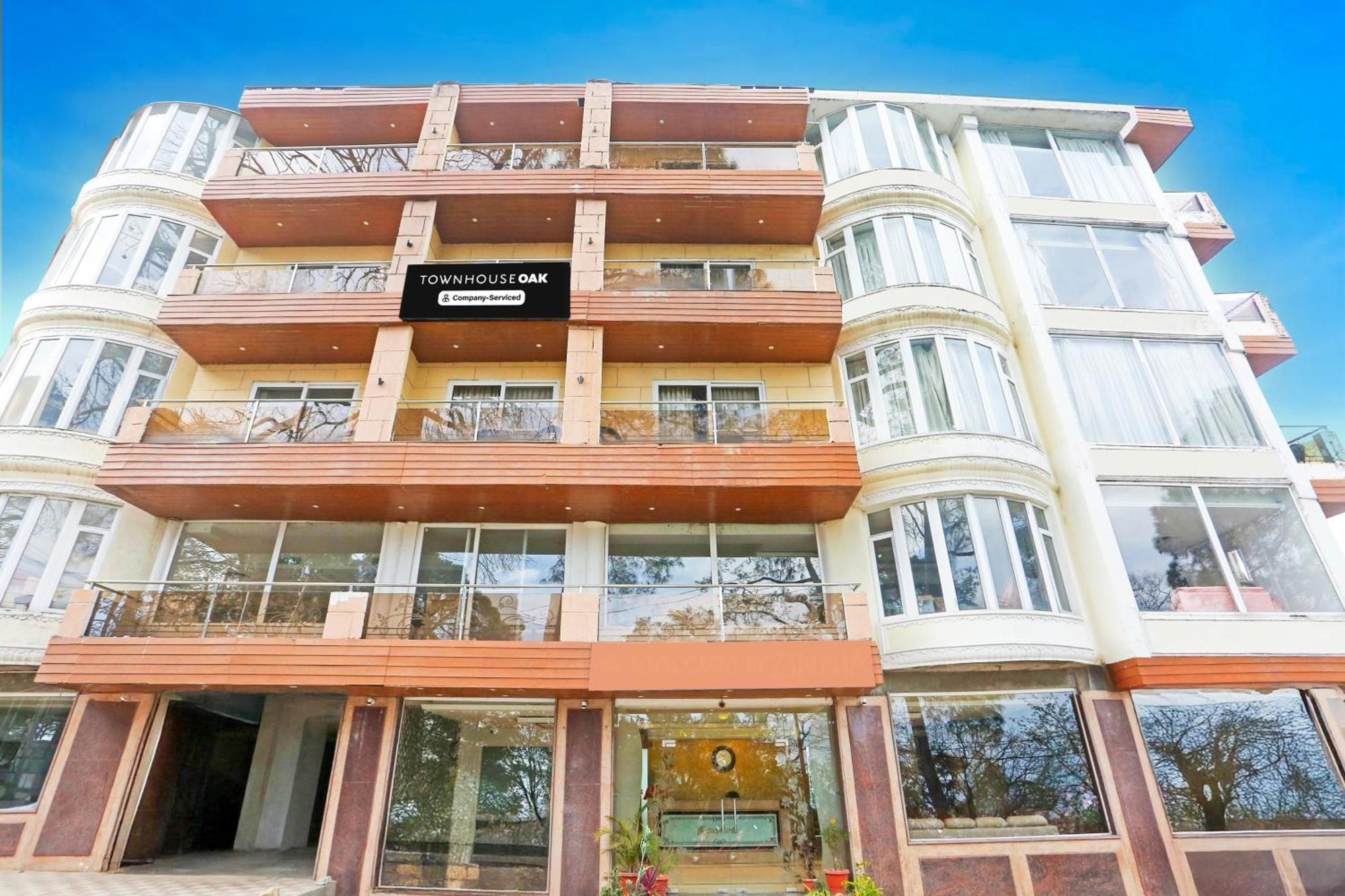 Super Townhouse Oak Dharamshala Near Maximus Mall Bagian luar foto
